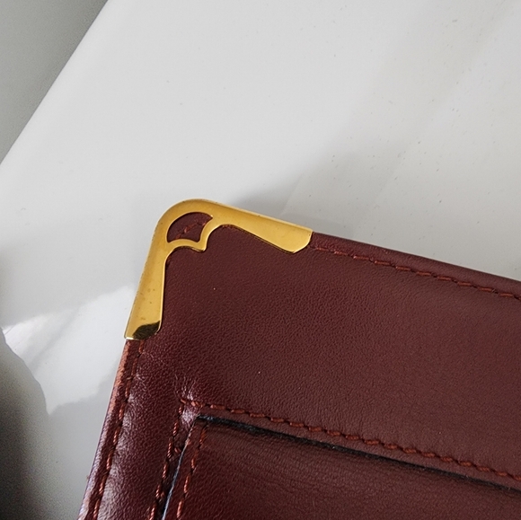 Cartier Burgundy Leather Clutch with Gold Accents